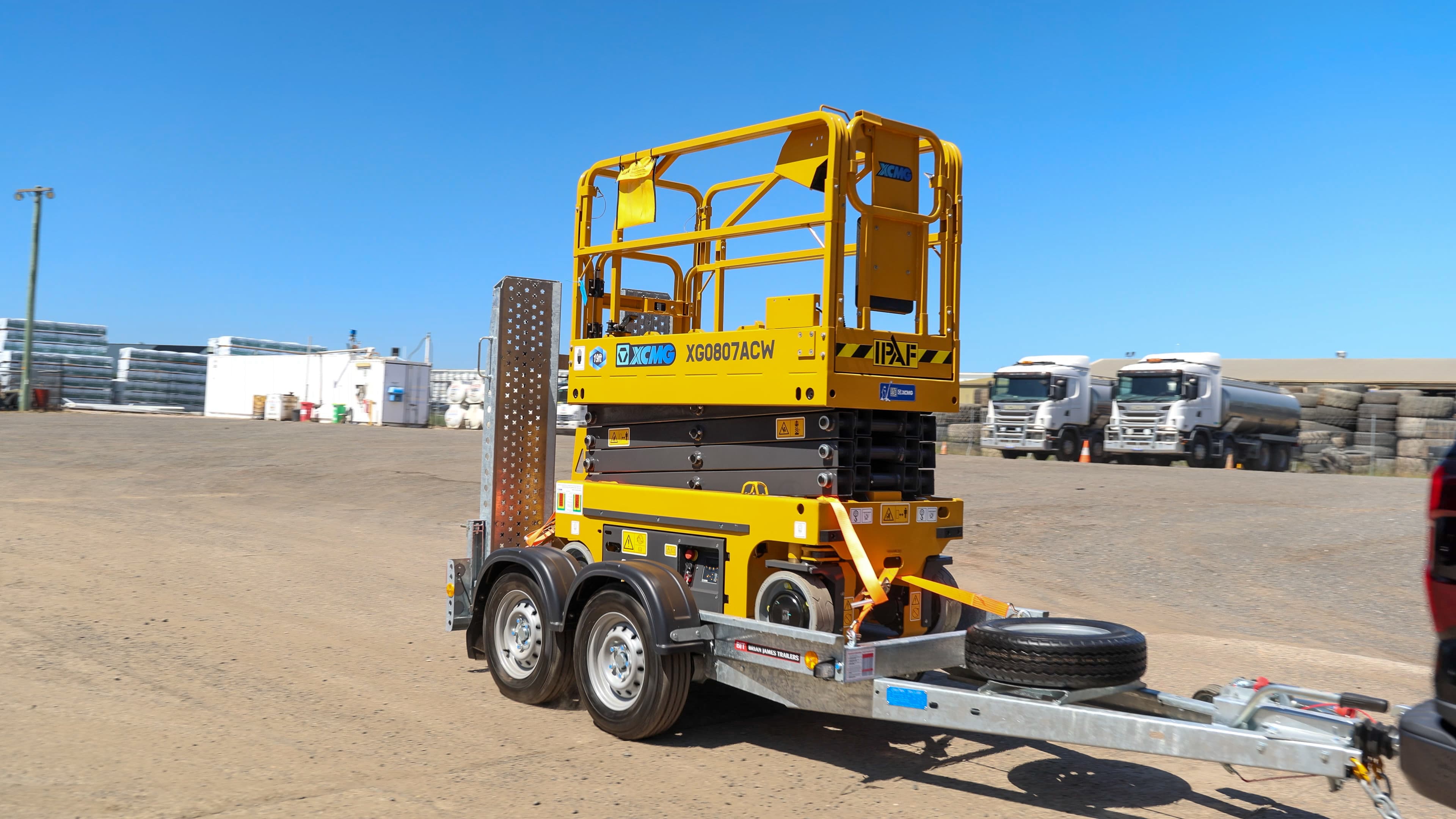 XCMG scissor lift on Brian James trailer